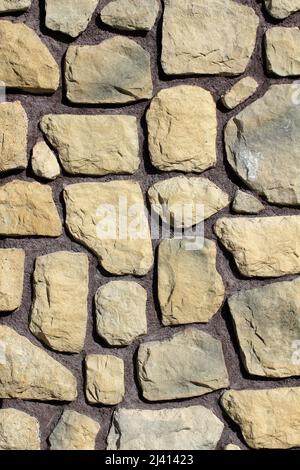Detail of a wall made of rubble stone Stock Photo