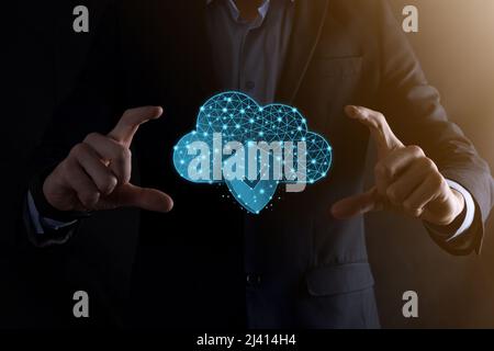 Cloud technology. Polygonal wireframe cloud storage sign with shield with a tick on dark blue. Cloud computing, big data center, future infrastructure Stock Photo