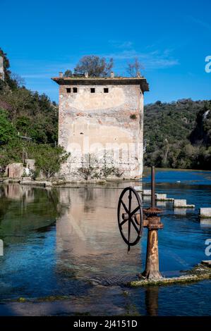 stifone tourist place characterized by this wheel and clear blue water Stock Photo