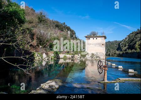 stifone tourist place characterized by this wheel and clear blue water Stock Photo