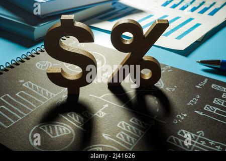 Return on Investment ROI concept. Financial results and dollar and percent signs. Stock Photo