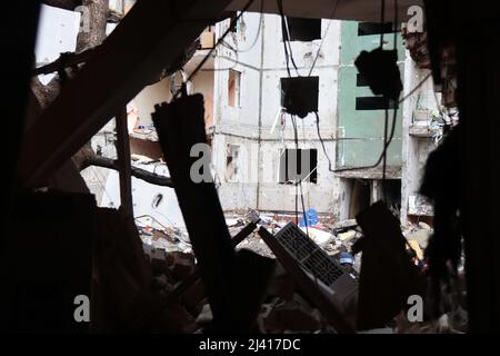 CHERNIHIV, UKRAINE - APRIL 9, 2022 - An apartment building damaged as a result of shelling by Russian invaders is pictured in Chernihiv, northern Ukra Stock Photo