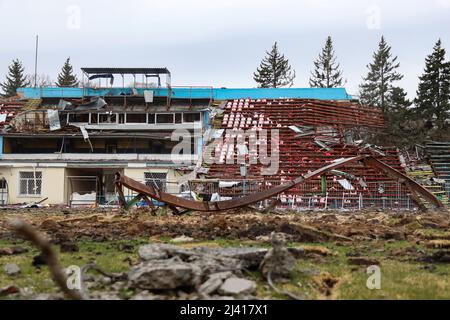Non Exclusive: CHERNIHIV, UKRAINE - APRIL 9, 2022 - The damaged rows of seats are pictured on the stands of the Chernihiv Olympic Sports Training Cent Stock Photo