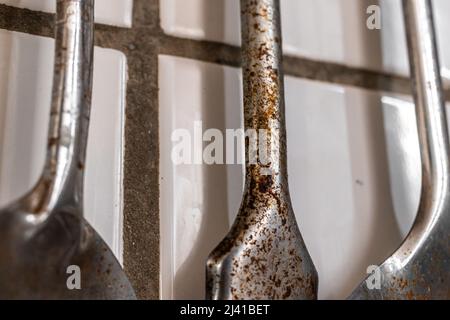 Old kitchenware with rust on metal. Vintage and retro kitchen appliances close-up view Stock Photo