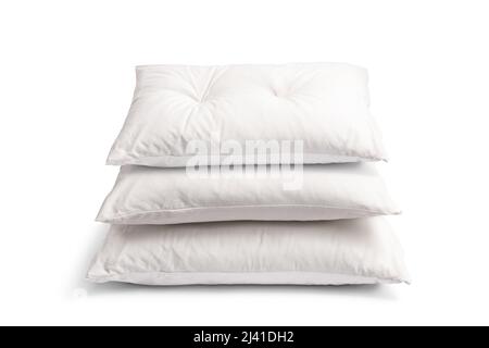 Pile of three white pillows isolated on white background Stock Photo