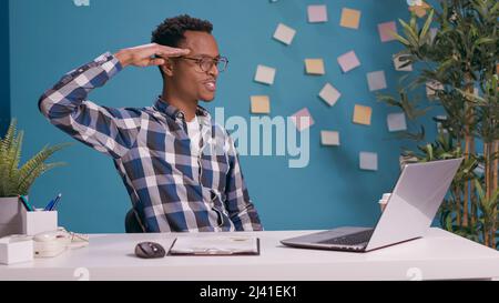 Saluting Screen Office worker doing military salute to show respect and patriotism ...