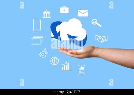 Woman hand showing cloud computing diagram. Cloud technology. Data storage. Networking and internet service concept. Stock Photo