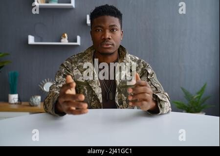 Military man looking at camera portrait Stock Photo
