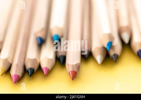 Close-up, multi-colored wooden pencils for drawing isolated. Stock Photo