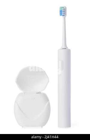 Dental floss and electric toothbrush set isolated on white background Stock Photo