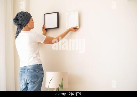 A wooden frame with empty space in women's hands Stock Photo