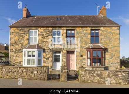 Example of a traditional Welsh semi detached cottages made of Welsh stone. Newport, Pembrokeshire, Wales. UK. Stock Photo