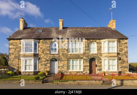 Example of a traditional Welsh semi detached cottages made of Welsh stone. Newport, Pembrokeshire, Wales. UK. Stock Photo