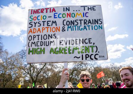 Extinction Rebellion protesters launching period of civil disruption in London from the 9 April 2022. IPCC Climate Change 2014 Synthesis Report quote Stock Photo