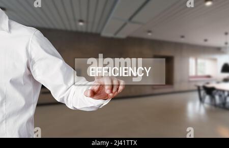Businessman pressing the word efficiency on a virtual search display screen. Stock Photo