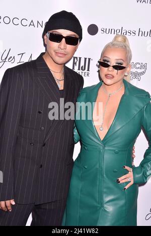 (L-R) Etienne Ortega and Christina Aguilera at The Daily Front Row's