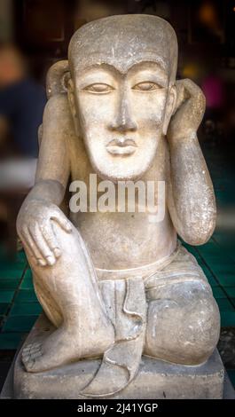 These idols can be seen all over the old town area of Bangkok. Most are at the entrance of many restaurants in Khoisan Rd. Stock Photo