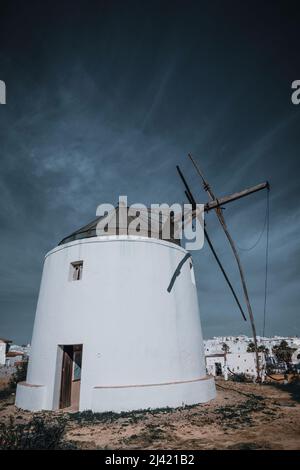 Old windmill located in Vejer de la Frontera, Andalusia, Spain. Stock Photo