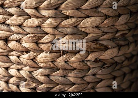 Wicker basket, close up background photo texture. Stock Photo