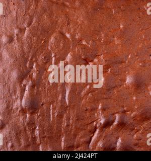 cake border surface, top layer of chocolate cake, background texture, closeup taken from above Stock Photo