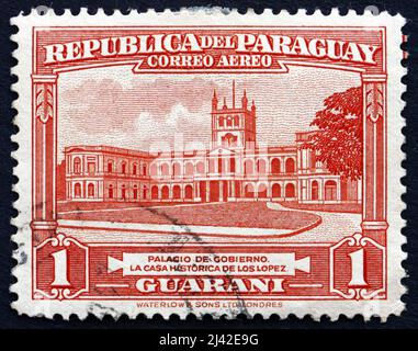 PARAGUAY - CIRCA 1946: a stamp printed in Paraguay shows Government House, Palace of the Lopez, Asuncion, circa 1946 Stock Photo