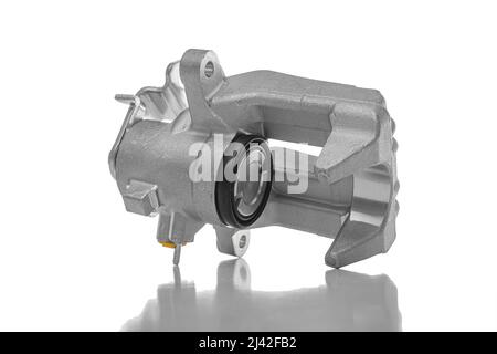 Car rear brake caliper isolated on white background. Stock Photo