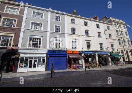 EXETER, UK - JULY 18, 2021 Queen Street shops and shoppers closed to vehicles Stock Photo