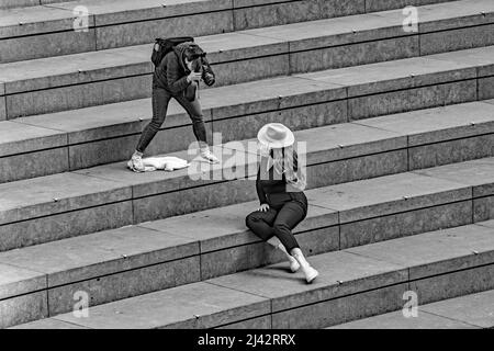 The model posing on the London Embankment steps Stock Photo