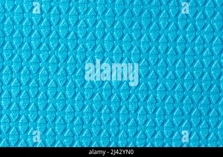 Background with rough texture of blue diamond triangles. Stock Photo