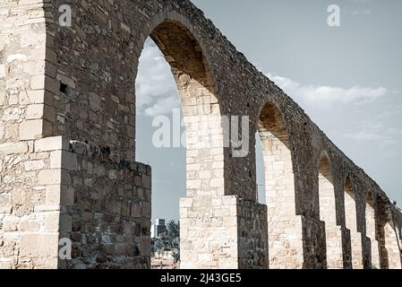 Stone built arches of Kamares Aqueduct in Larnaca, Cyprus Stock Photo