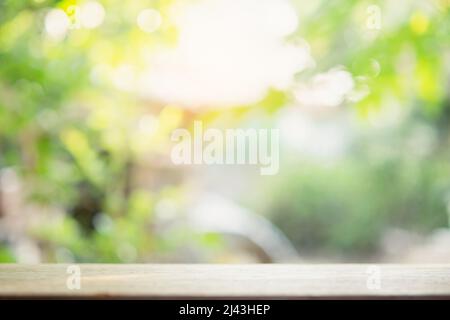 Empty wood table top and blur nature background with copy space for display or montage your products Stock Photo