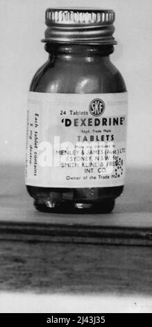 This bottle containing 5 milligrams of the drug cannot be sold legally, but a Sun reporter bought it over the counter in a city chemist shop. March 25, 1955.;This bottle containing 5 milligrams of the drug cannot be sold legally, but a Sun reporter bought it over the counter in a city chemist shop. Stock Photo