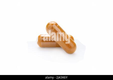 Turmeric Capsule isolated on white background with clipping path Stock Photo