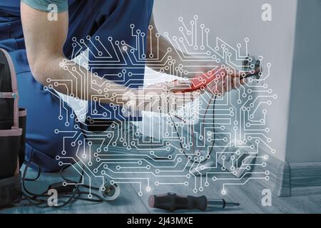 Double exposure of wiring diagram and electrician measuring voltage in socket Stock Photo