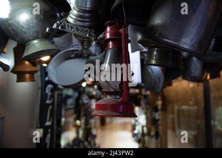 Old fashioned kerosene lamp vintage hanging, from the ceiling in an old passage Stock Photo