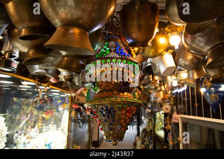 Old fashioned multicolored lamp old vintage hanging, from the ceiling in an old passage Stock Photo