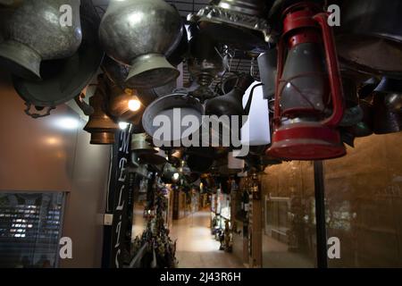 Old fashioned kerosene lamp vintage hanging, from the ceiling in an old passage Stock Photo