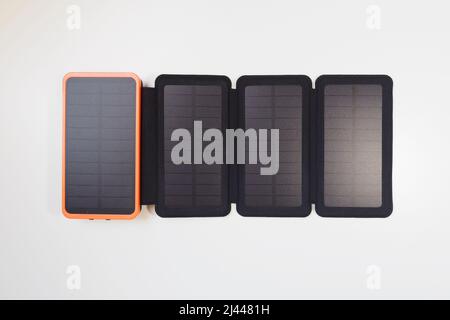 Portable power battery with solar panel. Stock Photo