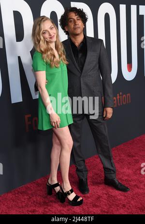 USA. Amanda Seyfried and Naveen Andrews in the (C)Hulu new mini- series: The  Dropout (2022). Plot: TV series that chronicles Theranos founder Elizabeth  Holmes' attempt to revolutionize the healthcare industry after dropping