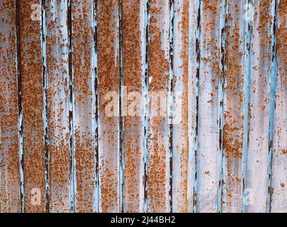 Urban, stylish white and rusted corrugated wall panel background texture and wallpaper graphics Stock Photo