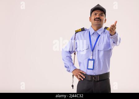 Portrait of Security guard objecting to something Stock Photo