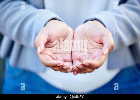 Ill keep your secrets. Closeup shot of an unrecognizable businessman standing with his hands cupped together. Stock Photo