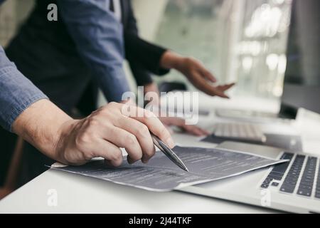 Developing programming and coding technologies working in a software engineers developing applications together in office. Stock Photo