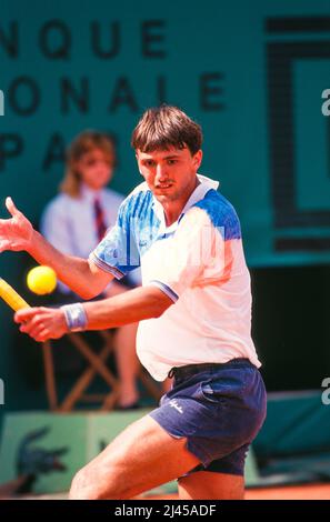 Croatian professional tennis player Goran Ivanisevic, here in May 1993, during the French Open, officially known as Roland-Garros Stock Photo