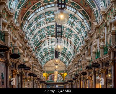 The ornate cast iron arched roof tresses of the County Arcade in the Victoria Quarter of Leeds. West Yorkshire. UK Stock Photo