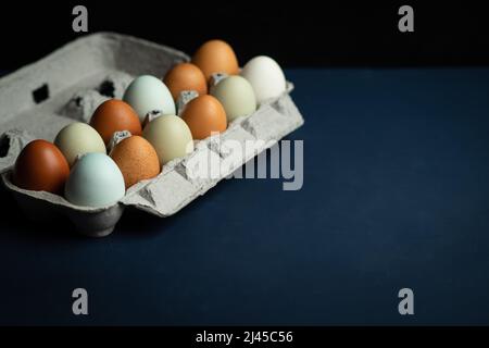 Fresh multicolored raw eggs Stock Photo