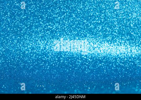 An abstract blue background with sparkle lights and bokeh. Stock Photo