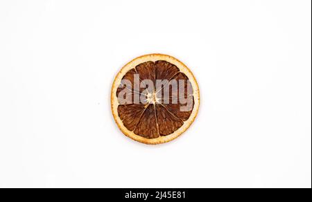 Dried orange slices isolated on a white background. Orange fruit chips. High quality photo Stock Photo