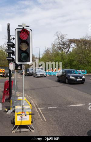 Roadworks and temporary traffic lights, London Stock Photo - Alamy