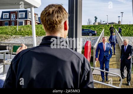 Rotterdam, Netherlands. 12th Apr, 2022. HOEK VAN HOLLAND - King Willem-Alexander arrives at a jetty to board the Z8 for a visit to the port of Rotterdam. The theme of the visit was the energy transition in the port, the role of the Maasvlakte and hydrogen ambitions. Credit: POOL ROBIN UTRECHT /ANP/Alamy Live News Stock Photo